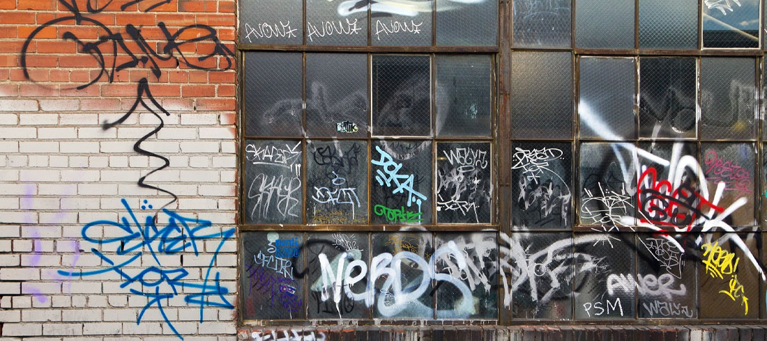 Picture of factory window with graffiti