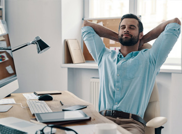 Office showing relaxed comfortable employee because of window tinting